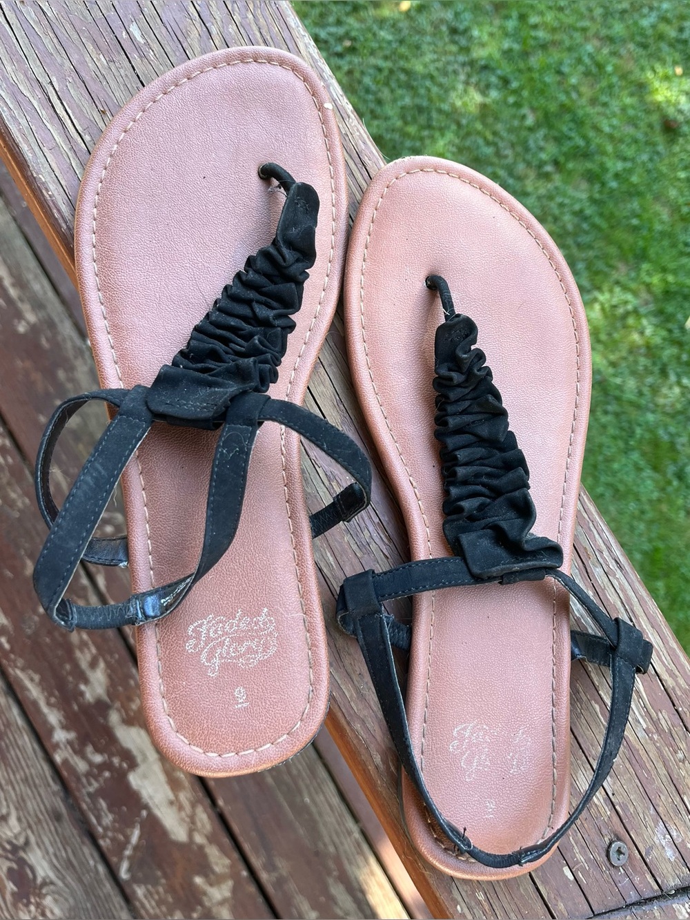 cute sandals with black straps
brand faded glory
size 9
